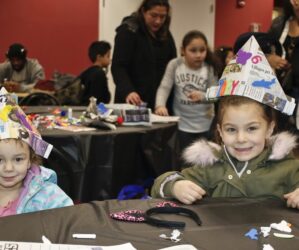 Leah and Zoey Macchia of Wantagh donned their decorated newspaper hats.