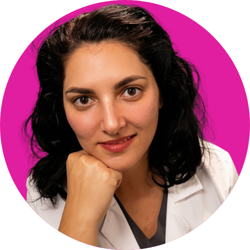 Portrait of a woman in a white lab coat, resting her chin on her hand against a bright pink background.