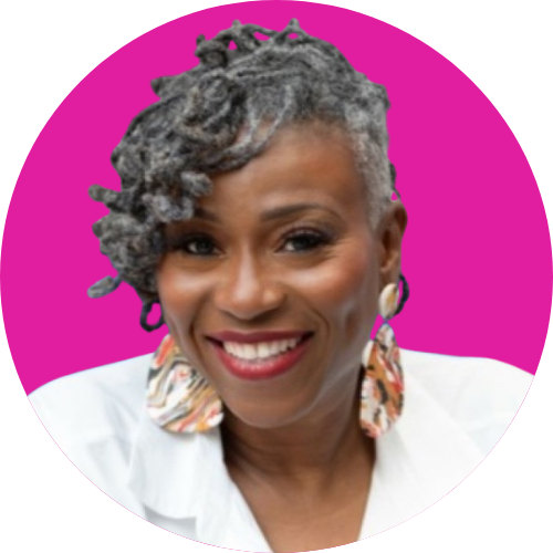 Smiling Black woman with short gray twists, wearing large patterned earrings and a white top, against a bright magenta circular background