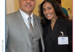 Two professionally dressed individuals pose for a photo at the 2026 Top Lawyers of Long Island event, wearing name badges.