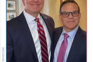 Two men in suits posing together at the 2026 Top Lawyers of Long Island event, smiling for the photo.