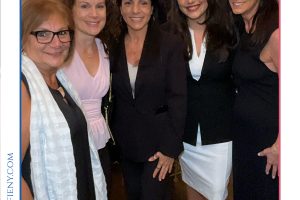 Group of five women in business attire smiling for a photo at a formal legal awards event (Top Lawyers of Long Island 2026 Herald)