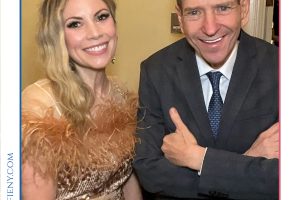 Two smiling adults in formal attire posing for a photo at the 2026 Top Lawyers of Long Island event, with branding above.
